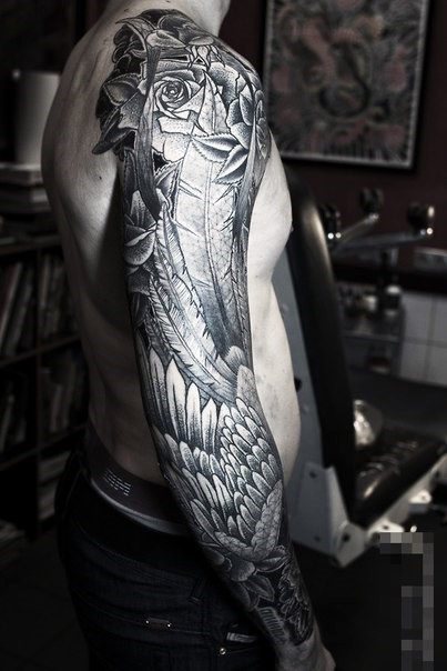 tatuaje plumas para hombre 57