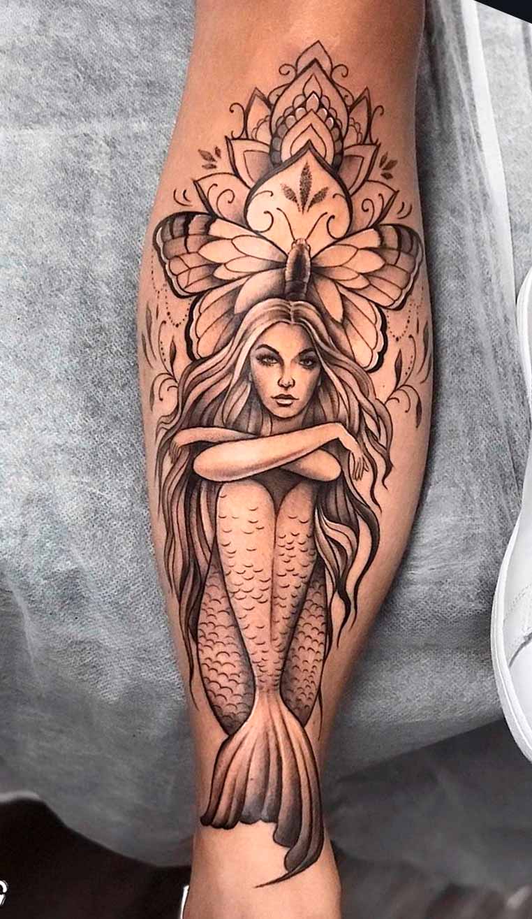 tatuaje en la pierna para mujer 35