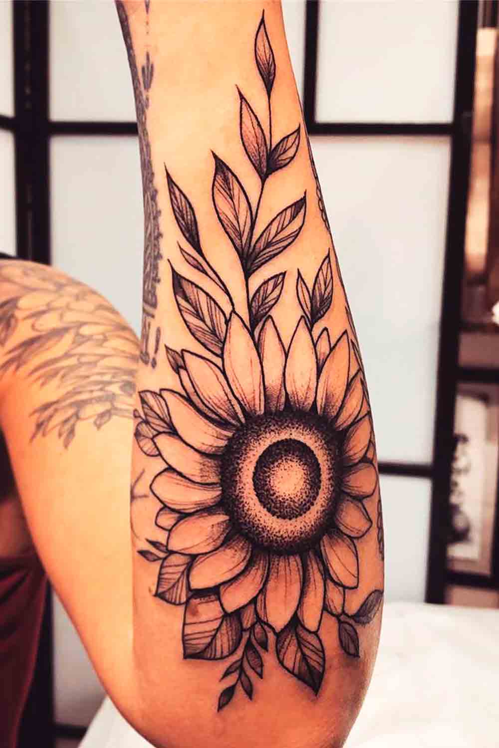 tatuaje girasol para mujer 15