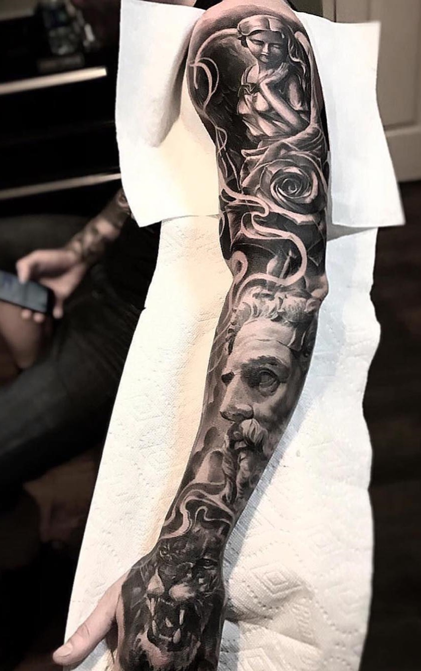 tattoo brazo completo en hombre 34