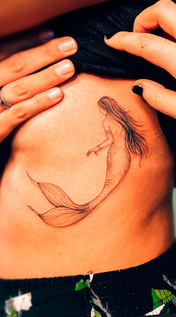 tatuaje de sirena en mujer 26