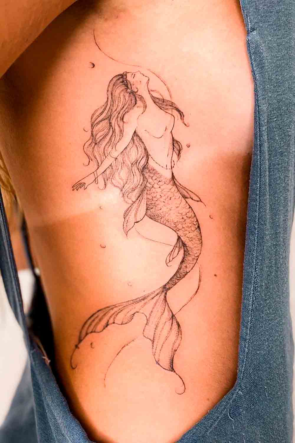 tatuaje de sirena en mujer 28