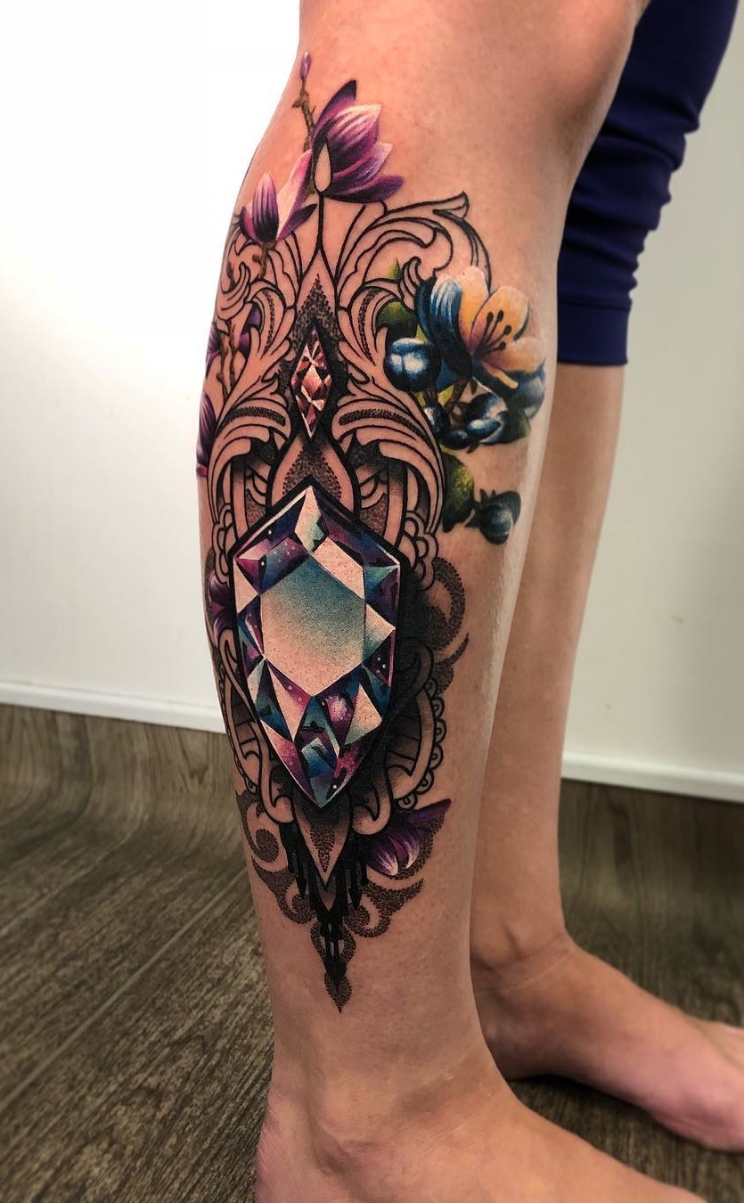 tatuaje en pierna de mujer 10