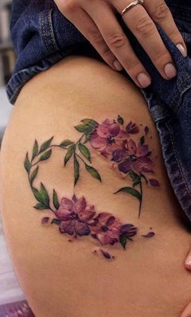 tatuaje en pierna de mujer 16