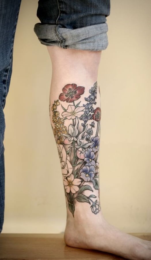 tatuaje en pierna de mujer 20