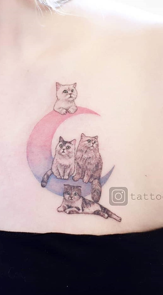 tatuaje gato en mujer 101