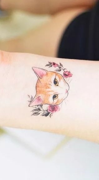 tatuaje gato en mujer 30