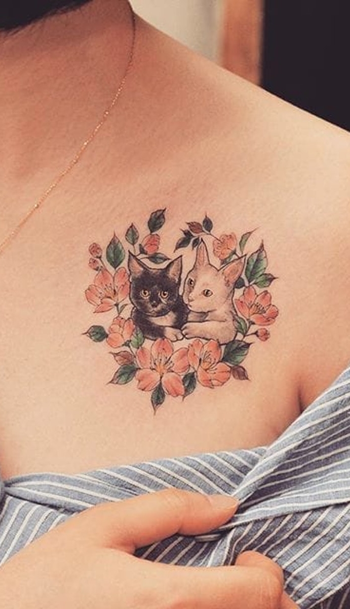 tatuaje gato en mujer 34
