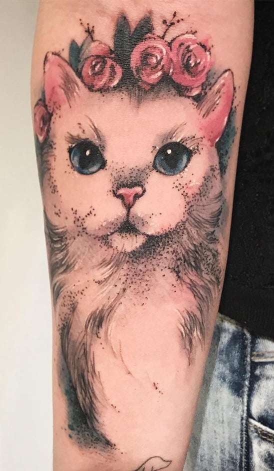tatuaje gato en mujer 58
