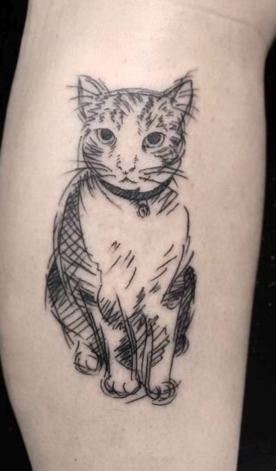 tatuaje gato en mujer 64