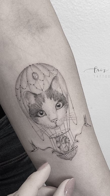 tatuaje gato en mujer 88